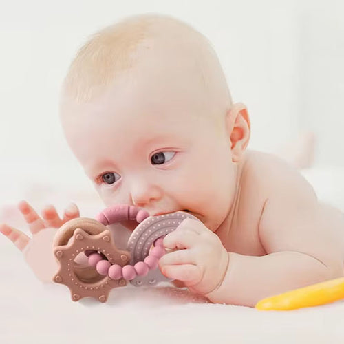 Anneau-dentition-bébé-rose-pour-fille